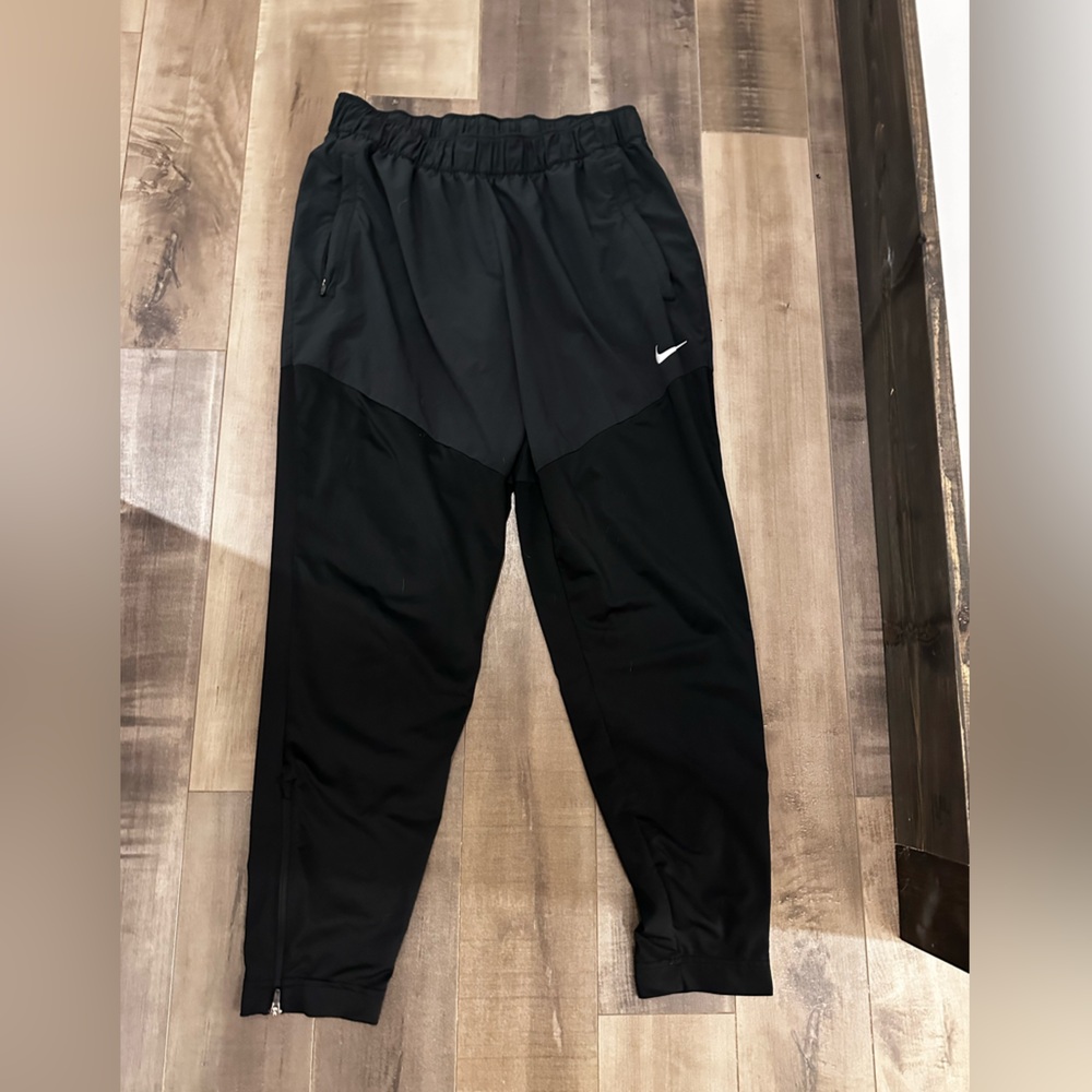 Nike track pants with ankle zippers